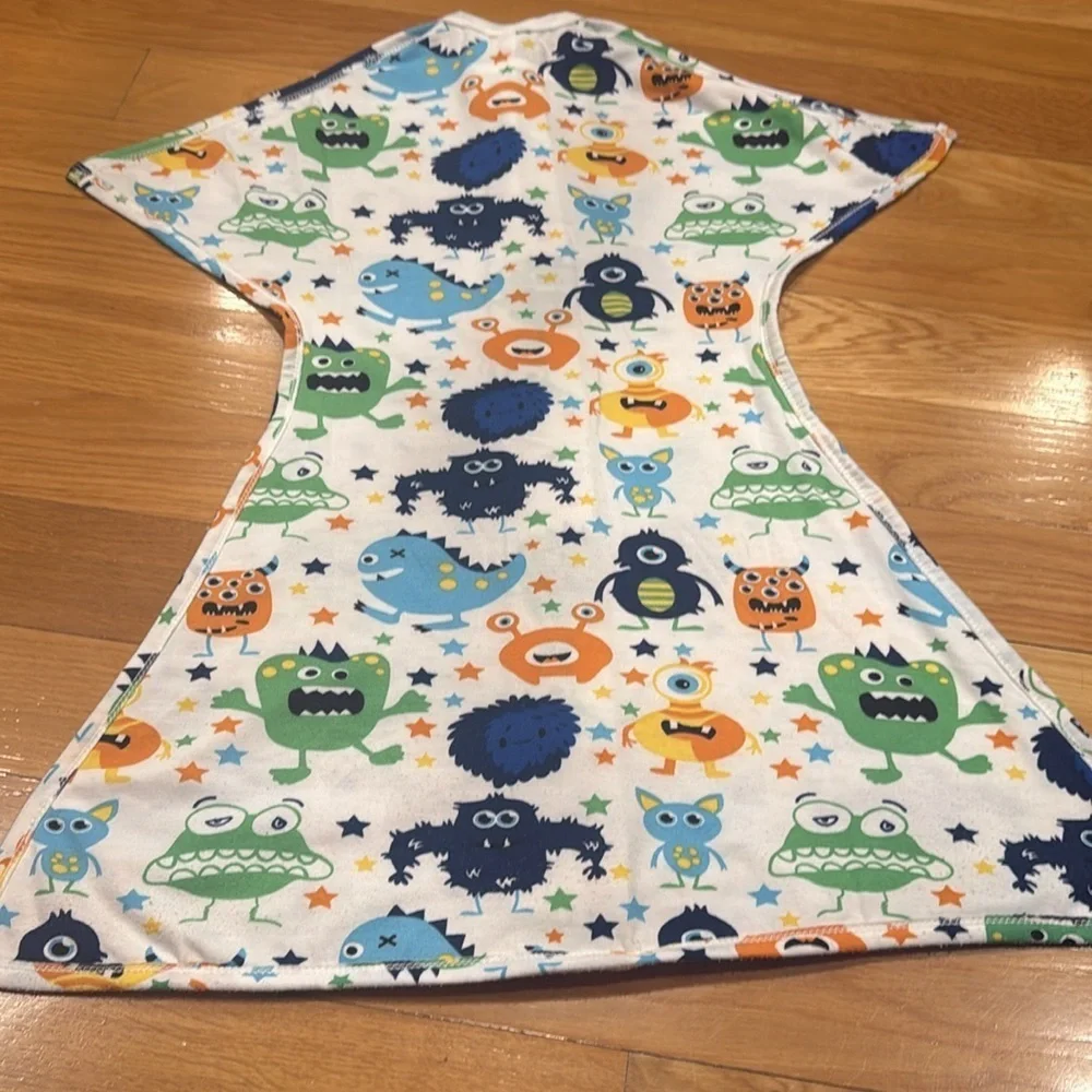 Sleeping baby Zipadee-zip mister boys sleep sack size 4-8 months.